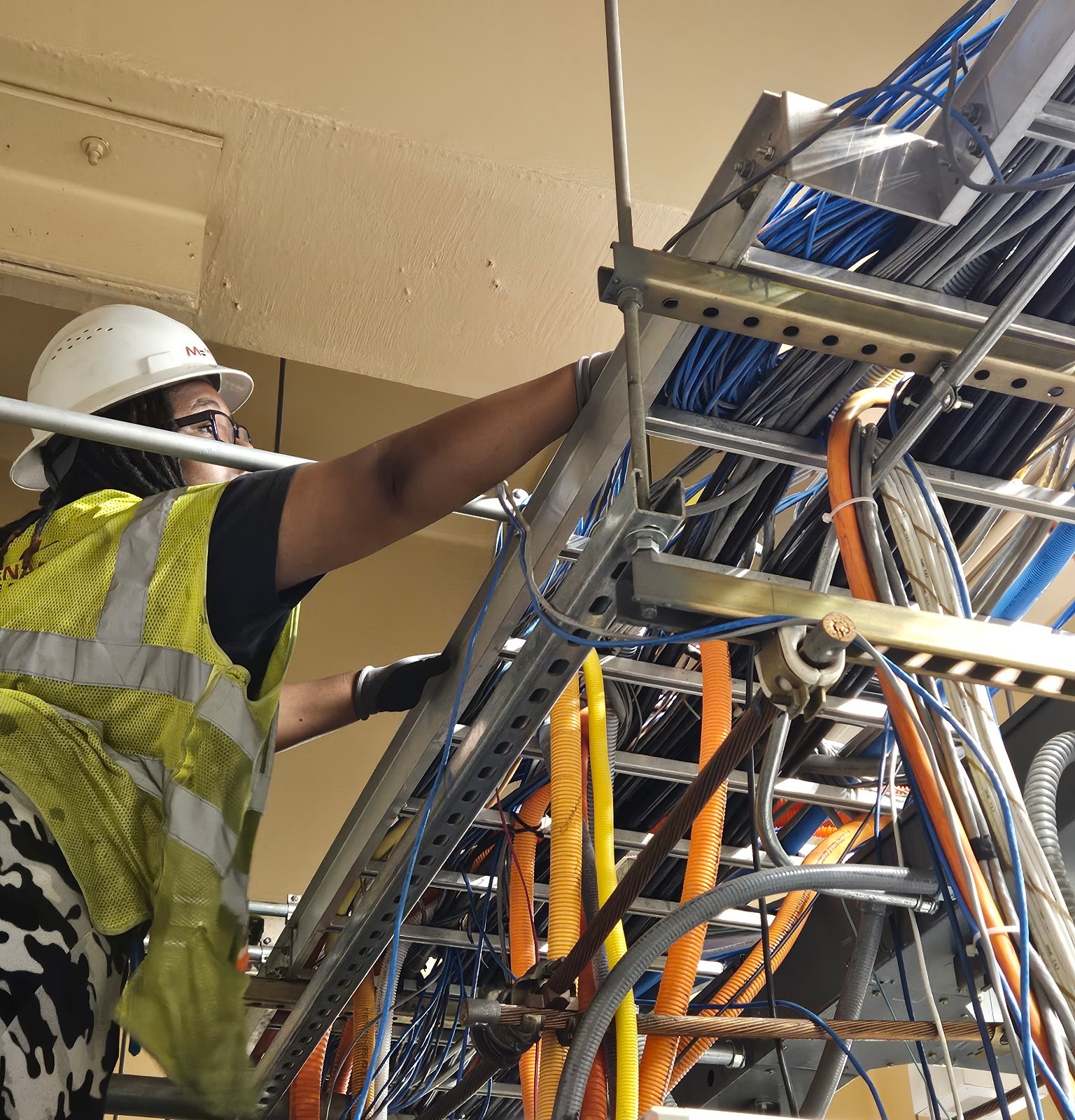 Worker on Ladder, Cabling